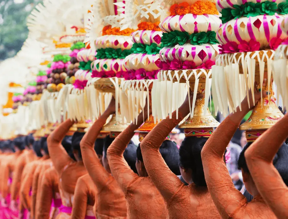 Balinese women carrying temple offerings in procession