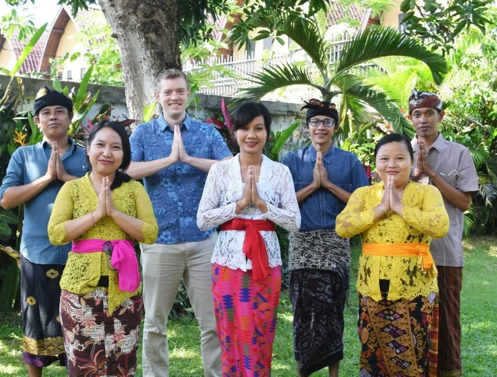 The Happy Trails! Asia team welcoming guests in traditional Balinese dress