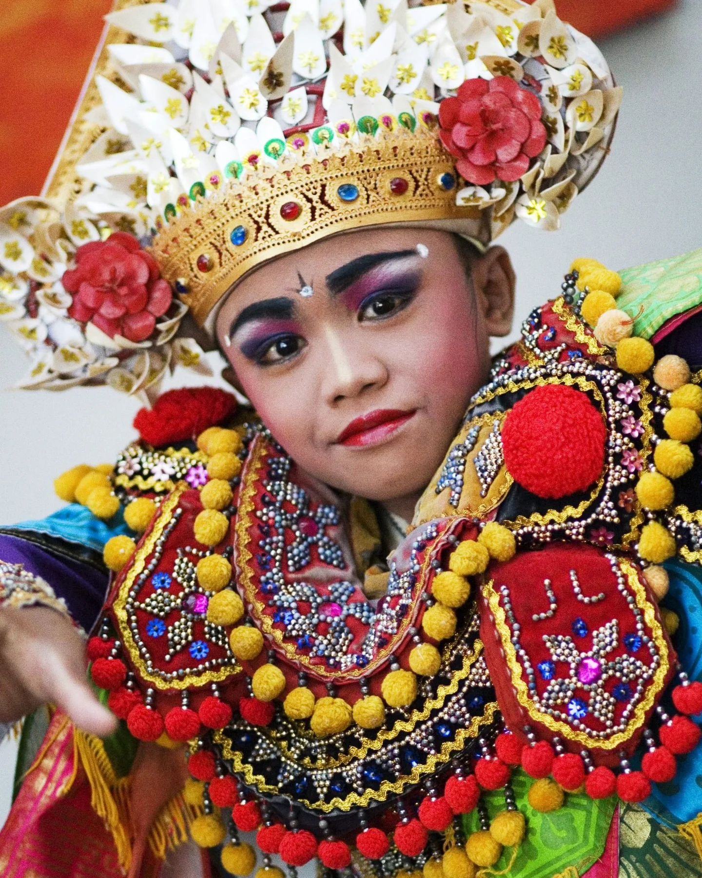 Young Balinese dancer in traditional costume